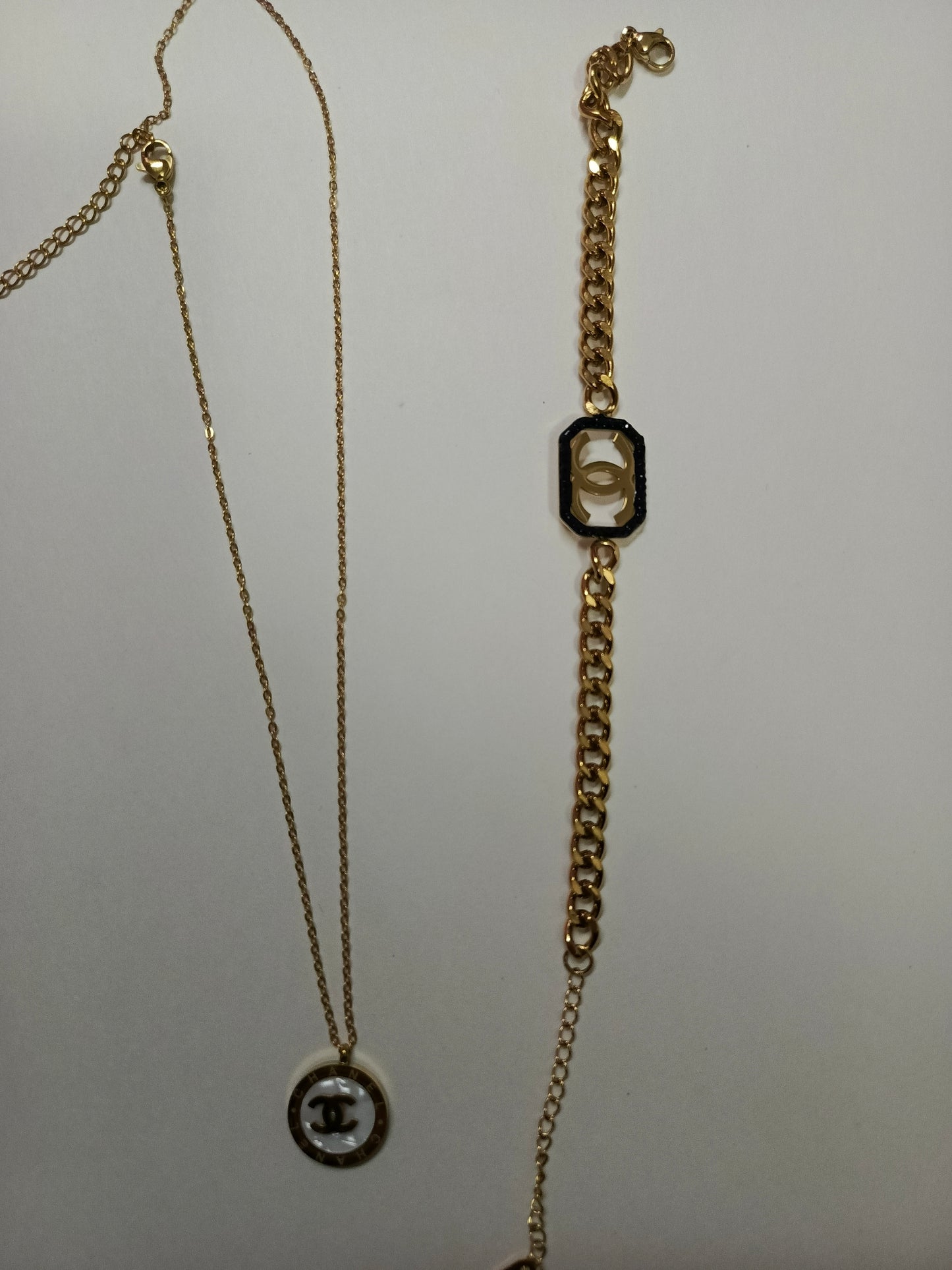 CHANEL PENDANT AND BRACELET